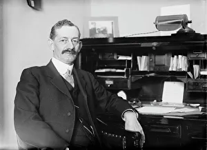 Congressman Prints: Robt. N. Page seated at desk, 1916. Creator: Bain News Service