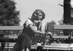 Portrait Photographs Prints: Roelof, Wilma, Miss, seated outdoors, 1932 July. Creator: Arnold Genthe