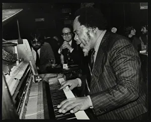 Roland Prints: Roland Hanna playing the piano, 1980. Artist: Denis Williams