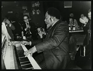 Applause Gallery: Roland Hanna playing the piano before an appreciative audience, 1980