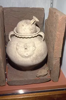 Cremation Prints: Roman Burial (Cremation) in a face urn, Colchester, Essex c125-200