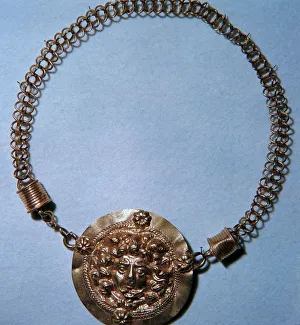 Gorgon Prints: Roman gold pendant of a Gorgons head, 2nd century