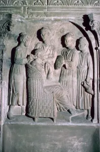 Roman relief of a womans hair being dressed Roman relief of a womans hair being dressed