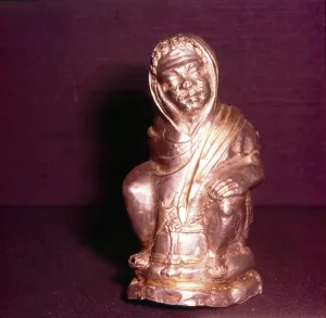 Roman Silver Pepper-Pot in the form of a Negro slave, c2nd-3rd century Roman Silver Pepper-Pot in the form of a Negro slave, c2nd-3rd century
