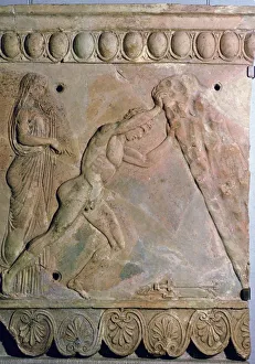 Roman terracotta Campana plaque showing Theseus lifting a huge rock