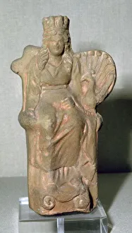 Roman terracotta figure of the goddess Juno, with a Peacock, 1st century