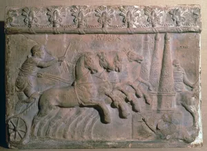 Roman terracotta panel showing a racing chariot