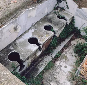 Plumbing Gallery: Roman toilet, Ostia, Italy