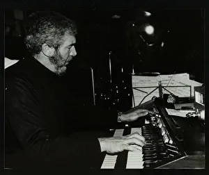 Ron Lohn playing the electronic organ at The Bell, Codicote, Hertfordshire, 22 February 1981