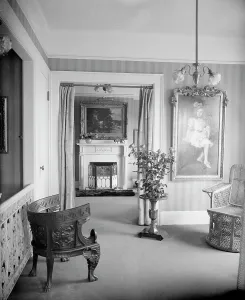 Room with painting of child, roses, and portiere, between 1900 and 1915. Creator: Unknown
