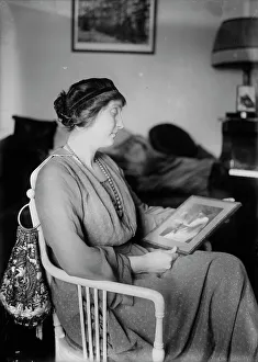 Looking At Prints: Rosalie Miller, between c1915 and c1920. Creator: Bain News Service