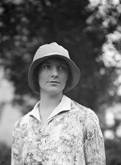Portrait Photographs Prints: Ross, June, Mrs. standing outdoors, 1929 June. Creator: Arnold Genthe