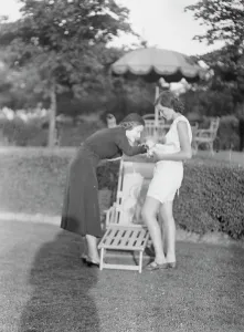 Portrait Photographs Prints: Rossbach, Miss, holding puppies, with another woman, 1932 June 30. Creator: Arnold Genthe