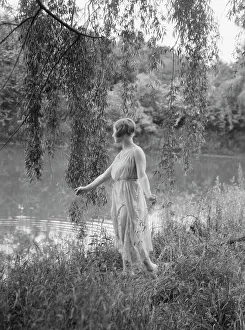 Portrait Photographs Prints: Rossin, F. Miss, standing outdoors, 1928 Creator: Arnold Genthe