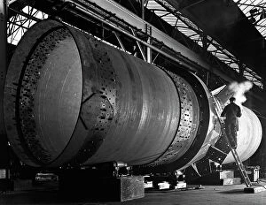 Kiln Gallery: A rotary kiln section being welded in preparation for installation, Steetley, Nottinghamshire, 1962