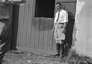 Portrait Photographs Prints: Rothbart, Albert, Mr. grounds, with unidentified man standing by a stable door