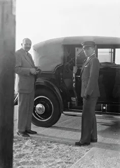 Portrait Photographs Prints: Rothbart, Albert, Mr. standing by his car with his chauffeur