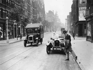 Rover Prints: A Rover 1928 10/25 HP sports car parked in a London street, 1931