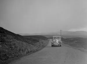 Rover Prints: Rover of SJ Clutterbuck competing in the RSAC Scottish Rally, 1936. Artist: Bill Brunell