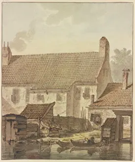 Waters Edge Prints: Row of houses by the water, two boats with a fisherman in front