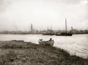 Rowing boat by a canal, Rotterdam, 1898. Artist: James Batkin
