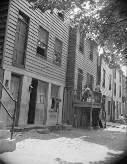 Staircase Gallery: Rows of homes in the Southwest area, Washington, D.C, 1942. Creator: Gordon Parks