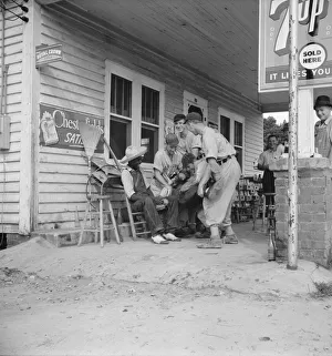 Rural filling station becomes community center... near Chapel Hill, North Carolina, 1939. Creator: Dorothea Lange