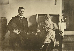 Russian author Leo Tolstoy with the balalaika player Boris Troyanovsky, Russia, 1909. Artist: Sophia Tolstaya