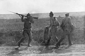 Comradship Gallery: Russian soldier assaulting his retreating comrade, Ternopil, Ukraine, First World War, 1 July 1917