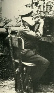 Observing Gallery: Russian soldier using a periscope rifle, First World War, 1914-1918, (c1920). Creator: Unknown