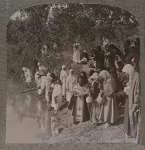 Russian women holding service on the banks of the Jordan, c1900