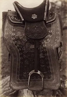 Saddle with Chinese Saddle-Cloth and Silver Mongolia Engraving over Iron, 1897. Creator: Unknown