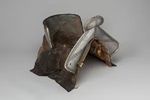 Armoured Prints: Saddle with Four Saddle Plates, Southern Germany, c. 1540. Creator: Unknown