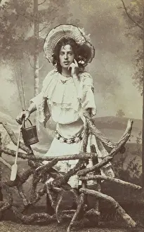Straw Hat Prints: A sailor in drag posed behind a wooden fence, 1906. Creator: Unknown