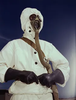 Hollem Howard Prints: Sailor at the Naval Air Base wears the new type protective clothing