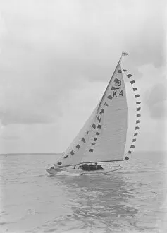 Bermuda Rig Collection: Saling yacht Asphodel (K5) with prize flags, 1922. Creator: Kirk & Sons of Cowes