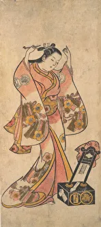Sanjo Kantaro as a Woman Arranging Her Hair Before a Lacquer Mirror, before 1763