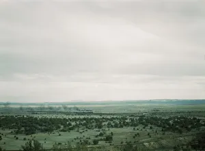 Santa Fe R. R. freight train rounding a curve between Ash Fork and Gleed, Arizona, 1943. Creator: Jack Delano