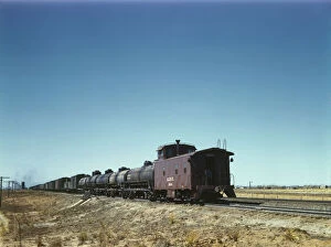 Santa Fe R.R. west bound freight stopping for water, Melrose, New Mexico, 1943. Creator: Jack Delano