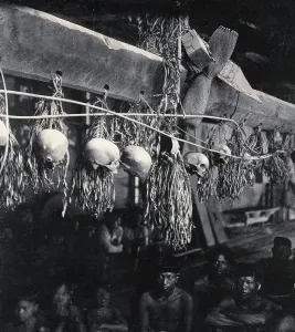 Beam Prints: Sarawak: decorated human skulls hanging in a Kayan house, c1900. Creator: Unknown