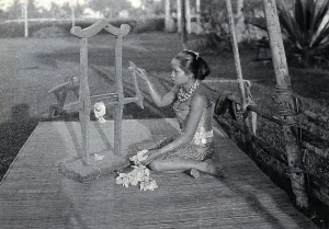 Seed Prints: Sarawak: a girl extracting the seeds of raw cotton in a cotton gin