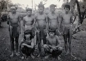 Crouching Prints: Sarawak: a group of Kelabit men, c1900. Creator: Unknown