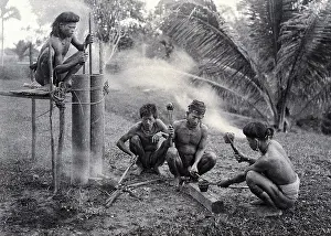 Crouching Prints: Sarawak: a Kalabit smithy, c1900. Creator: Unknown