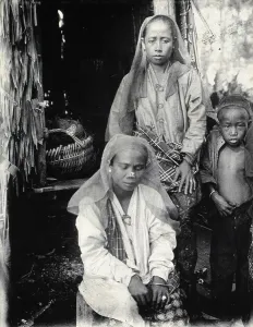 South East Asia Prints: Sarawak: two Malay women and a child, c1900. Creator: Unknown