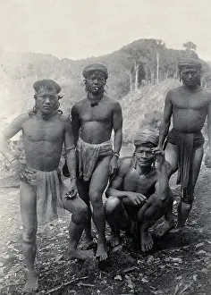 Southeast Asia Prints: Sarawak: four Punan men, c1900. Creator: Unknown