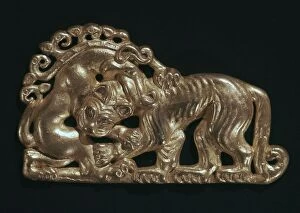 Beast Gallery: Sarmatian gold open-work plaque showing a tiger and fantastic beast