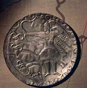 Sassanian Silver-Gilt Dish of King Peroz I, (459-484) Hunting Mouflon, c5th century Sassanian Silver-Gilt Dish of King Peroz I, (459-484) Hunting Mouflon, c5th century