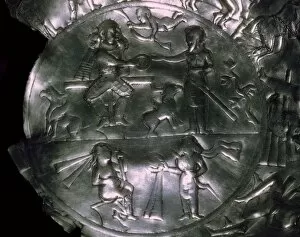 A Sassanid silver dish showing the investiture of a King