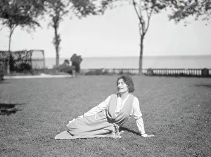 Portrait Photographs Prints: Savagoy, Henriette, seated on a lawn, 1922 July 31. Creator: Arnold Genthe