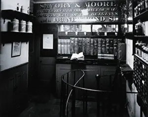 Shop Sign Prints: Savory & Moore Ltd: interior of the pharmacy;... c1880s. Creator: Unknown